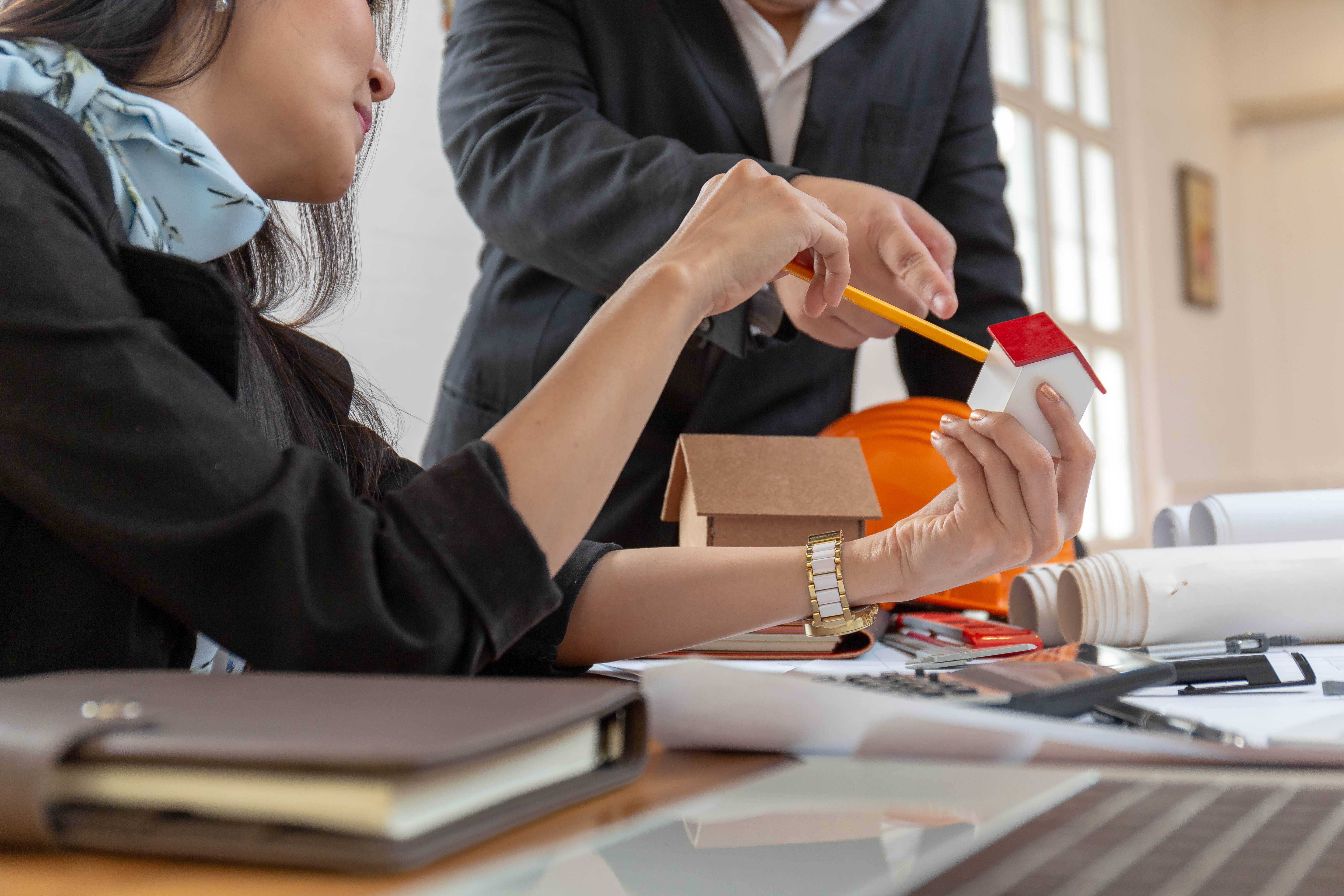 Architects and engineers coordinating mixed-use project